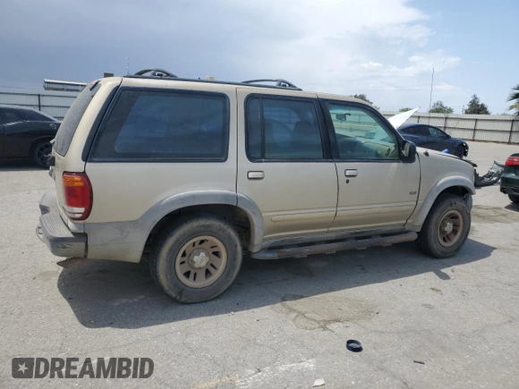 2001 Ford Explorer XLS with VIN 1FMZU62E01ZA22192, listed as a Copart auction lot 58791565 with 218,582 mi miles and Salvage title. Bid and sale history available at DreamBid. Image 3.