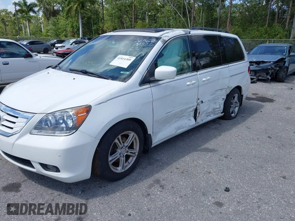 2008 Honda Odyssey Touring with VIN 5FNRL38858B006304, listed as a IAAI auction lot 41814309 with 208,778 mi miles. Bid and sale history available at carsss.com. Image 6.