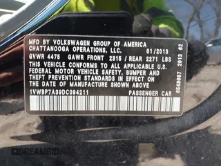 2013 Volkswagen Passat SE z VIN 1VWBP7A39DC094211, wystawiony jako IAAI lot #41894764 z przebiegiem 130 955 mil mil oraz . Historia ofert i sprzedaży dostępna na DreamBid. Obrazek 9.