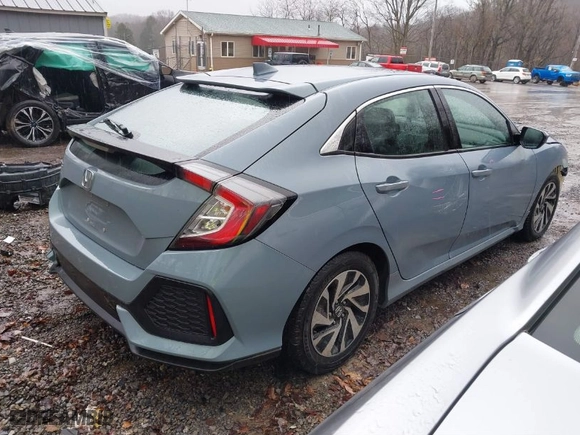 2018 Honda Civic Hatchback LX with VIN SHHFK7H2XJU421311, listed as a IAAI auction lot 41685190 with 81,187 mi miles. Bid and sale history available at carsss.com. Image 4.