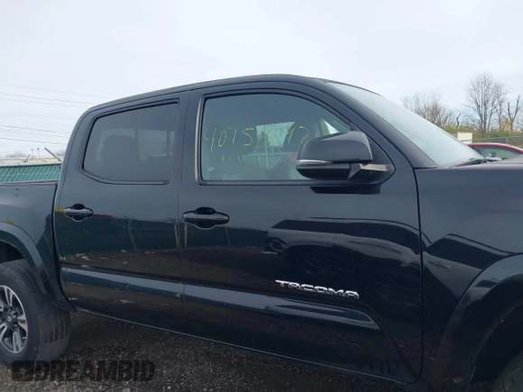 2018 Toyota Tacoma SR5 with VIN 3TMAZ5CN6JM055632, listed as a IAAI auction lot 40751593 with 125,663 mi miles and . Bid and sale history available at DreamBid. Image 14.