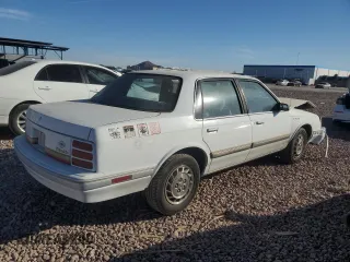 1993 Oldsmobile Cutlass Ciera S z VIN 1G3AG54NXP6406135, wystawiony jako Copart lot #86319294 z przebiegiem 90 019 mil mil oraz Szkoda całkowita • Salvage title. Historia ofert i sprzedaży dostępna na DreamBid. Obrazek 3.