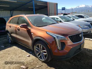 2021 Cadillac XT4 AWD Sport with VIN 1GYFZFR42MF054048, listed as a Copart auction lot 42597083 with 27,825 mi miles. Bid and sale history available at carsss.com. Image 4.