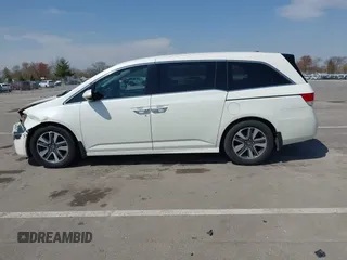 2016 Honda Odyssey Touring Elite with VIN 5FNRL5H97GB044278, listed as a IAAI auction lot 42056101 with 182,396 mi miles and . Bid and sale history available at DreamBid. Image 14.