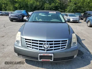 2007 Cadillac DTS V8 z VIN 1G6KD57Y67U136984, wystawiony jako Copart lot #65570084 z przebiegiem 114 814 mil mil oraz Szkoda całkowita • Salvage title. Historia ofert i sprzedaży dostępna na DreamBid. Obrazek 5.