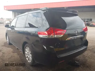 2014 Toyota Sienna XLE with VIN 5TDYK3DC0ES518522, listed as a IAAI auction lot 42025124 with 1 mi miles. Bid and sale history available at carsss.com. Image 3.