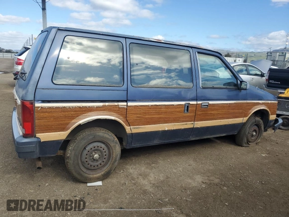 1987 Plymouth Voyager z VIN 2P4FH51G8HR130018, wystawiony jako Copart lot #47295285 z przebiegiem 68 113 mil mil oraz Tytuł czysty. Historia ofert i sprzedaży dostępna na DreamBid. Obrazek 3.