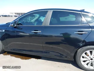 2016 Kia Optima EX with VIN 5XXGU4L38GG032056, listed as a IAAI auction lot 42013867 with 145,466 mi miles. Bid and sale history available at carsss.com. Image 14.