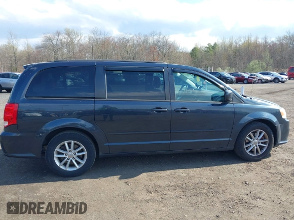 2013 Dodge Grand Caravan SXT with VIN 2C4RDGCG2DR652708, listed as a IAAI auction lot 42043026 with 245,442 mi miles and . Bid and sale history available at DreamBid. Image 6.