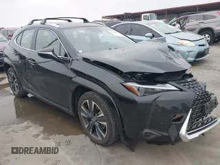 2023 Lexus UX 250h Premium z VIN JTHP6JBH5P2153167, wystawiony jako IAAI lot #41432919 z przebiegiem 20 608 mil mil oraz . Historia ofert i sprzedaży dostępna na DreamBid. Obrazek 1.