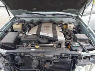 2004 Lexus LX 470 z VIN JTJHT00W143546192, wystawiony jako IAAI lot #41673810 z przebiegiem 232 196 mil mil oraz . Historia ofert i sprzedaży dostępna na DreamBid. Obrazek 10.