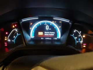 2019 Honda Civic Sedan LX with VIN 2HGFC2F69KH555697, listed as a IAAI auction lot 41664312 with 112,993 mi miles. Bid and sale history available at carsss.com. Image 7.