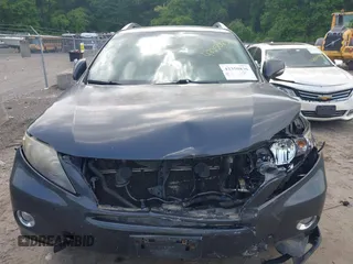 2010 Lexus RX 450h with VIN JTJBC1BA1A2407503, listed as a IAAI auction lot 42350836 with 203,687 mi miles and . Bid and sale history available at DreamBid. Image 12.