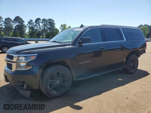 2019 Chevrolet Suburban LS with VIN 1GNSCGECXKR208615, listed as a Copart auction lot 52187105 with 174,105 mi miles and Salvage title. Bid and sale history available at DreamBid. Image 1.