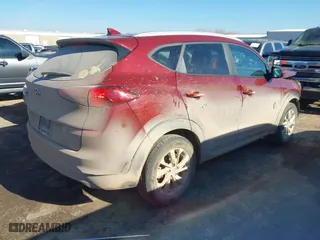 2019 Hyundai Tucson Value with VIN KM8J33A40KU077246, listed as a IAAI auction lot 41344888 with 72,259 mi miles. Bid and sale history available at carsss.com. Image 4.