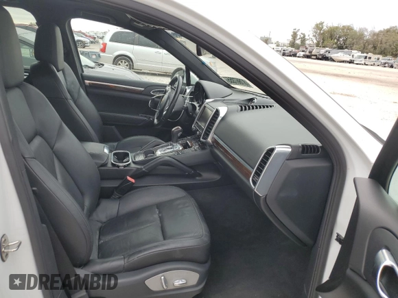 2012 Porsche Cayenne S Hybrid z VIN WP1AE2A20CLA92536, wystawiony jako Copart lot #87667355 z przebiegiem 117 267 mil mil oraz Czysty tytuł • Clean title. Historia ofert i sprzedaży dostępna na DreamBid. Obrazek 11.