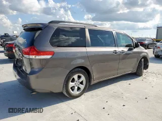 2014 Toyota Sienna LE AAS with VIN 5TDKK3DC8ES445454, listed as a Copart auction lot 62014095 with 143,601 mi miles and Salvage title. Bid and sale history available at DreamBid. Image 3.