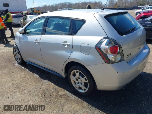 2009 Pontiac Vibe with VIN 5Y2SM67049Z409441, listed as a IAAI auction lot 41873091 with 145,169 mi miles. Bid and sale history available at carsss.com. Image 3.