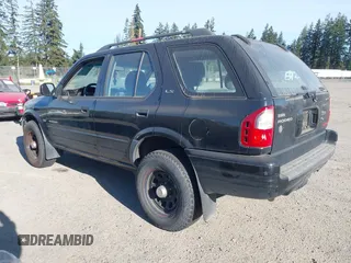 2000 Isuzu Rodeo z VIN 4S2DM58W8Y4348987, wystawiony jako IAAI lot #42024517 z przebiegiem 286 400 mil mil oraz . Historia ofert i sprzedaży dostępna na DreamBid. Obrazek 3.