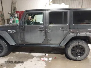 2016 Jeep Wrangler Unlimited Sport with VIN 1C4BJWDG2GL210060, listed as a IAAI auction lot 41546979 with 13,542 mi miles and . Bid and sale history available at DreamBid. Image 14.