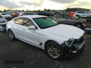 2022 Genesis G70 2.0T with VIN KMTG34TA0NU088955, listed as a IAAI auction lot 40444202 with 14,315 mi miles and . Bid and sale history available at DreamBid. Image 1.