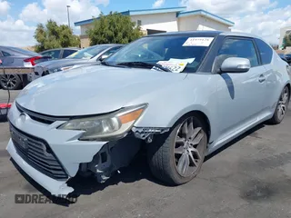 2014 Scion tC with VIN JTKJF5C71E3077886, listed as a IAAI auction lot 41939128 with 138,845 mi miles. Bid and sale history available at carsss.com. Image 19.
