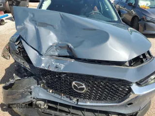 2025 Mazda CX-30 S Carbon Edition z VIN 3MVDMBCM5SM773318, wystawiony jako Copart lot #55027585 z przebiegiem 7 213 mil mil oraz Nie do naprawy • Non repairable. Historia ofert i sprzedaży dostępna na DreamBid. Obrazek 11.