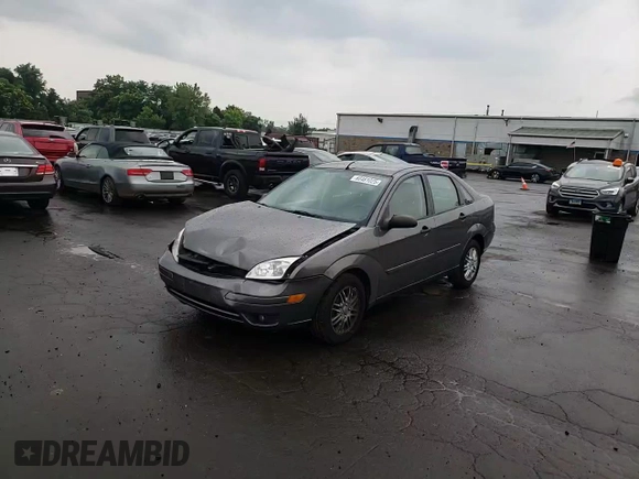 2007 Ford Focus S z VIN 1FAHP34N07W177912, wystawiony jako Copart lot #60481025 z przebiegiem 114 086 mil mil oraz Szkoda całkowita • Salvage title. Historia ofert i sprzedaży dostępna na DreamBid. Obrazek 14.