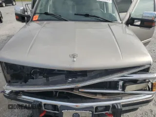 2000 Chevrolet Tahoe Z71 with VIN 1GNEK13R7YR189177, listed as a Copart auction lot 56830725 with 308,270 mi miles and Salvage title. Bid and sale history available at DreamBid. Image 12.