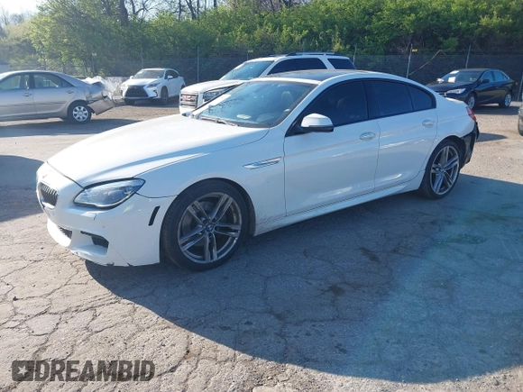 2016 BMW 6 Series 640i xDrive with VIN WBA6D2C51GGT66209, listed as a IAAI auction lot 42064405 with 113,500 mi miles and . Bid and sale history available at carsss.com. Image 2.