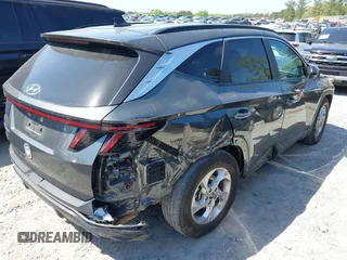 2022 Hyundai Tucson SEL with VIN 5NMJB3AEXNH144592, listed as a IAAI auction lot 42037487 with 75,651 mi miles and . Bid and sale history available at DreamBid. Image 4.