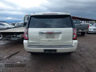 2015 GMC Yukon XL Denali with VIN 1GKS2JKJ2FR590502, listed as a IAAI auction lot 41758575 with 129,777 mi miles. Bid and sale history available at carsss.com. Image 15.
