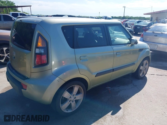 2010 Kia Soul + with VIN KNDJT2A20A7102463, listed as a IAAI auction lot 42093896 with 178,736 mi miles. Bid and sale history available at carsss.com. Image 4.