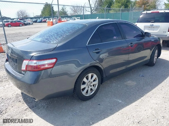 2009 Toyota Camry Hybrid with VIN 4T1BB46K99U067345, listed as a IAAI auction lot 41889254 with 245,427 mi miles. Bid and sale history available at carsss.com. Image 4.