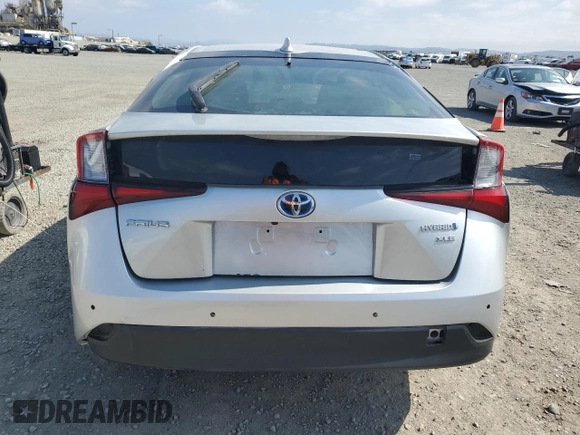 2021 Toyota Prius L Eco with VIN JTDKAMFU8M3145511, listed as a Copart auction lot 55166085 with 14,846 mi miles and Salvage Title. Bid and sale history available at DreamBid. Image 6.