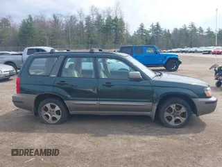 2003 Subaru Forester XS with VIN JF1SG65663H738935, listed as a IAAI auction lot 42119765 with 200,141 mi miles. Bid and sale history available at carsss.com. Image 19.