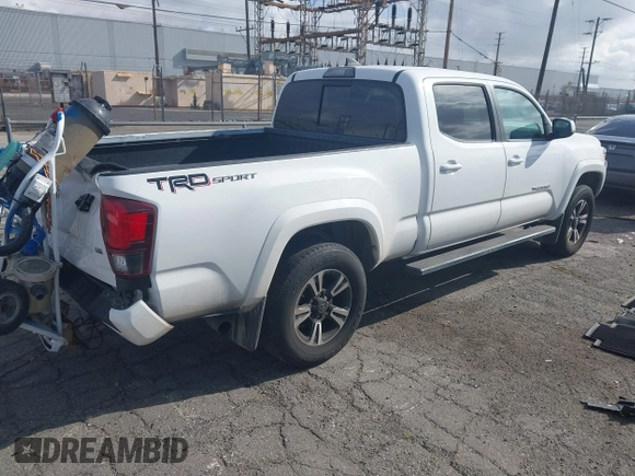 2018 Toyota Tacoma SR5 with VIN 3TMBZ5DN7JM016650, listed as a IAAI auction lot 41903835 with 105,123 mi miles and . Bid and sale history available at DreamBid. Image 4.