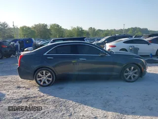 2015 Cadillac ATS Sedan Luxury RWD with VIN 1G6AB5RX4F0122156, listed as a IAAI auction lot 42012891 with 137,879 mi miles. Bid and sale history available at carsss.com. Image 13.