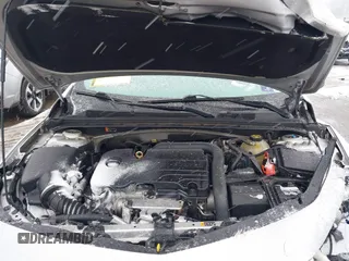 2018 Chevrolet Malibu LT z VIN 1G1ZD5STXJF269890, wystawiony jako IAAI lot #41504935 z przebiegiem 107 190 mil mil oraz . Historia ofert i sprzedaży dostępna na DreamBid. Obrazek 10.