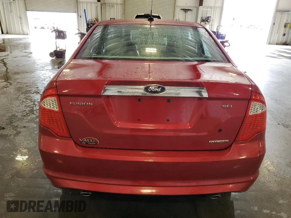 2012 Ford Fusion SEL z VIN 3FAHP0JG0CR265666, wystawiony jako Copart lot #62860355 z przebiegiem 126 812 mil mil oraz Szkoda całkowita • Salvage title. Historia ofert i sprzedaży dostępna na DreamBid. Obrazek 6.