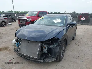 2021 Mazda CX-30 S with VIN 3MVDMAAL4MM302042, listed as a IAAI auction lot 42288275 with 39,821 mi miles and . Bid and sale history available at DreamBid. Image 18.