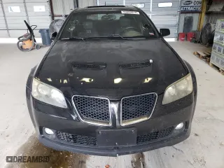 2009 Pontiac G8 with VIN 6G2ER57749L228811, listed as a Copart auction lot 59982614 with 184,222 mi miles and Salvage Title. Bid and sale history available at carsss.com. Image 5.
