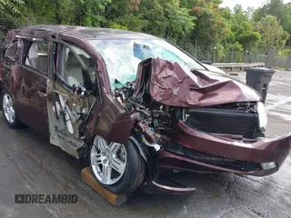 2012 Honda Odyssey Touring z VIN 5FNRL5H98CB035454, wystawiony jako IAAI lot #42285987 z przebiegiem Nie podano mil oraz . Historia ofert i sprzedaży dostępna na DreamBid. Obrazek 12.