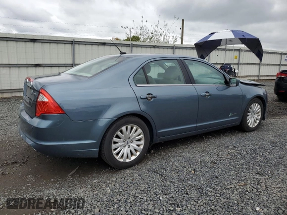 2012 Ford Fusion Hybrid с VIN 3FADP0L32CR184712, выставлен на аукционе Copart как лот 58517555 с пробегом 196 644 миль миль и Списание • Salvage title. История ставок и продаж доступна на DreamBid. Изображение 3.