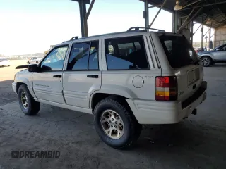 1996 Jeep Grand Cherokee with VIN 1J4EZ78Y9TC104398, listed as a Copart auction lot 69706254 with Not provided miles and Salvage title. Bid and sale history available at DreamBid. Image 2.