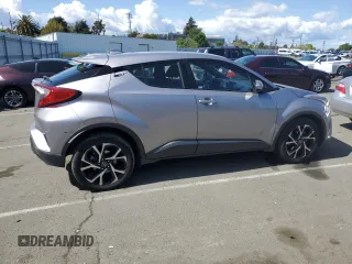 2018 Toyota C-HR XLE with VIN NMTKHMBX6JR047937, listed as a Copart auction lot 51705805 with 128,543 mi miles and Salvage Title. Bid and sale history available at DreamBid. Image 3.