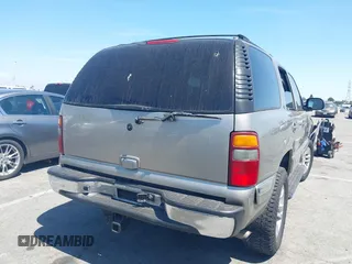 2002 GMC Yukon SLT with VIN 1GKEC13T62R202059, listed as a IAAI auction lot 42023547 with 1 mi miles. Bid and sale history available at carsss.com. Image 4.