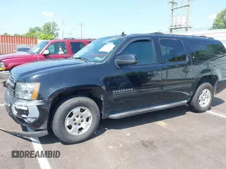 2011 Chevrolet Suburban LT with VIN 1GNSKJE34BR151246, listed as a IAAI auction lot 42520210 with 239,240 mi miles and . Bid and sale history available at DreamBid. Image 17.
