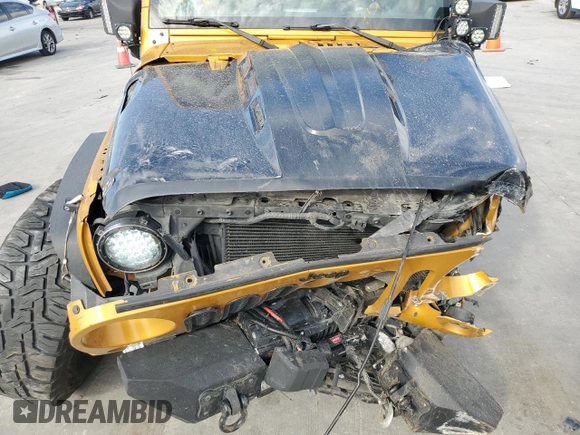 2014 Jeep Wrangler Sport z VIN 1C4AJWAG7EL181121, wystawiony jako Copart lot #42599235 z przebiegiem 130 721 mil mil oraz Szkoda całkowita • Salvage title. Historia ofert i sprzedaży dostępna na DreamBid. Obrazek 11.