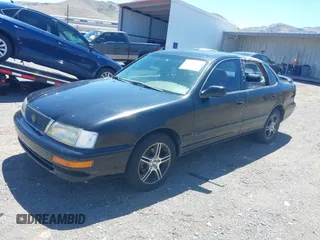 1997 Toyota Avalon XL with VIN 4T1BF12B0VU173301, listed as a IAAI auction lot 42182842 with 278,775 mi miles and . Bid and sale history available at DreamBid. Image 2.